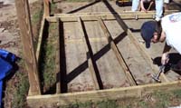 Becca putting in some of the first floor joists